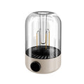 Beige and black multifunctional camping ambience light with an analog brightness knob and USB port.