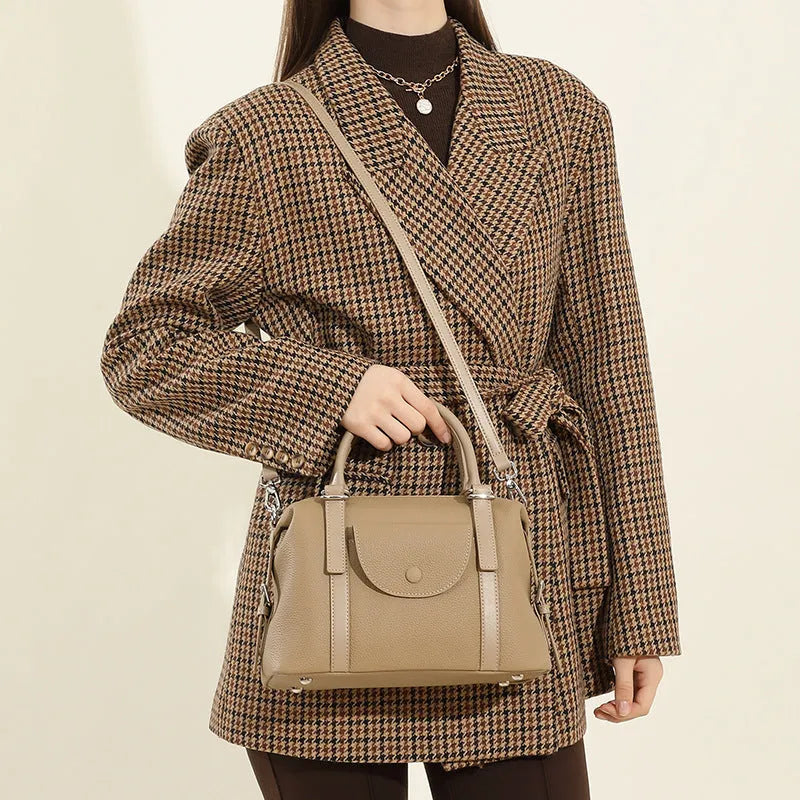 Genuine leather ladies' handbag in elephant grey with contrast stitching and lock detail, 27x12x20cm