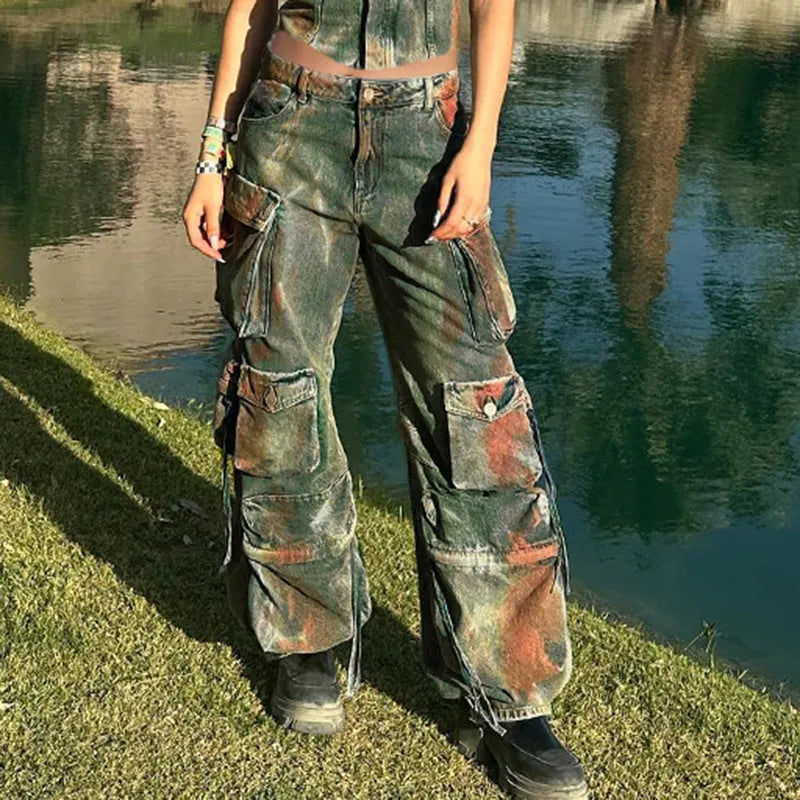 Loose cargo denim trousers with gradient colour pockets on a model, showing street hipster style.