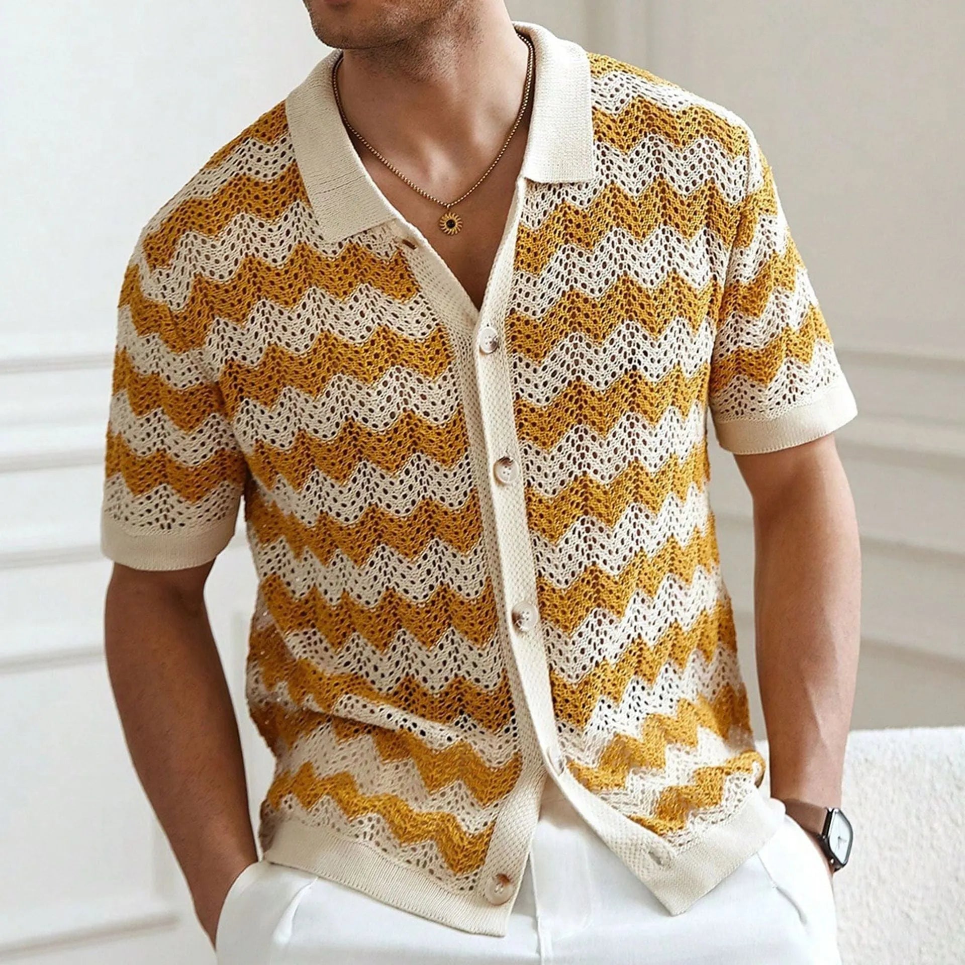American-style hollow jacquard corrugated sweater with flocking detail in blue, showing short sleeves and textured fabric