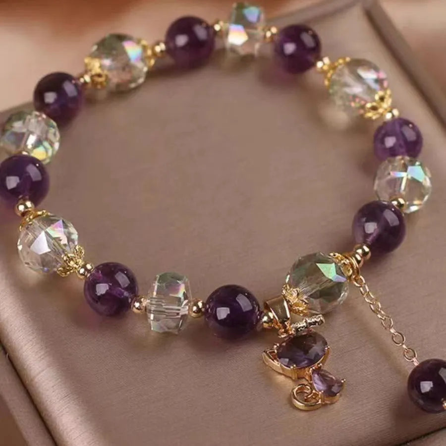 Antique style women's crystal bracelet with a nine-tailed fox pendant and a natural purple amethyst flower charm.
