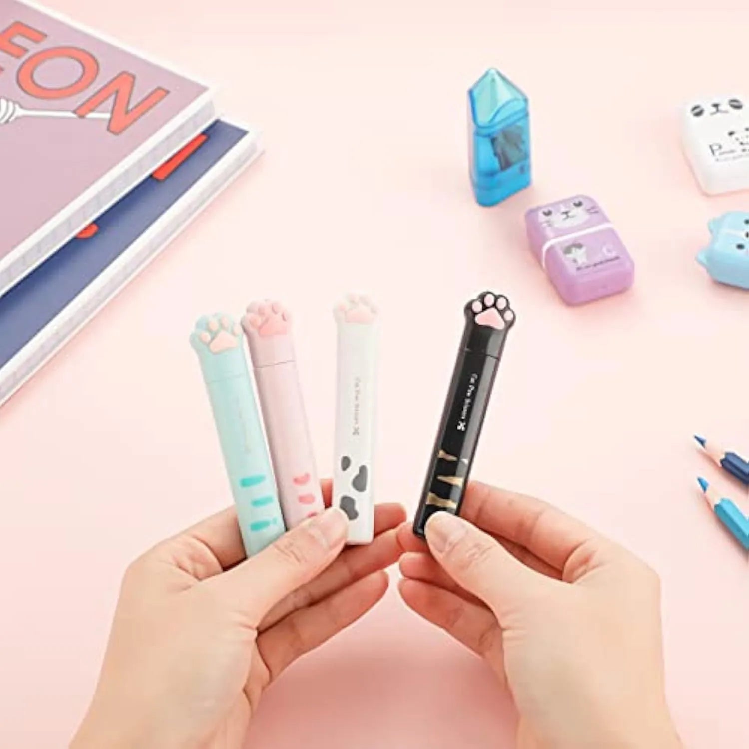 Cat paw mini folding scissors in four colours showing stainless steel blades and compact 8.7cm size