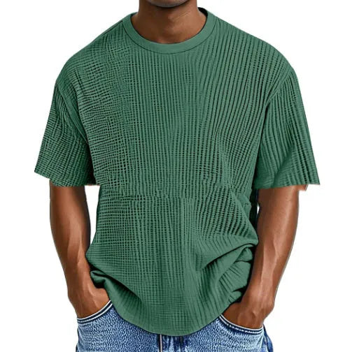 Men's light blue waffle knit short sleeve cotton blend t-shirt laid flat, showing texture and regular fit.