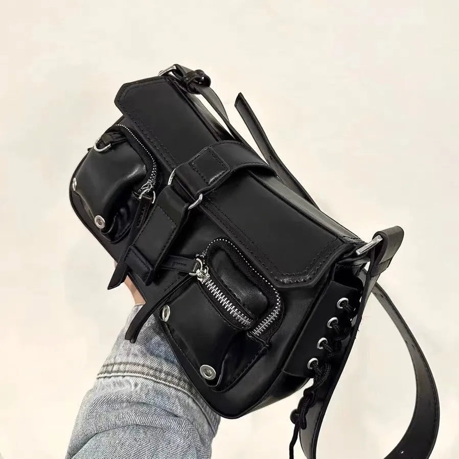 Black PU messenger bag with adjustable strap, showing compact 16cm height and 27cm width dimensions