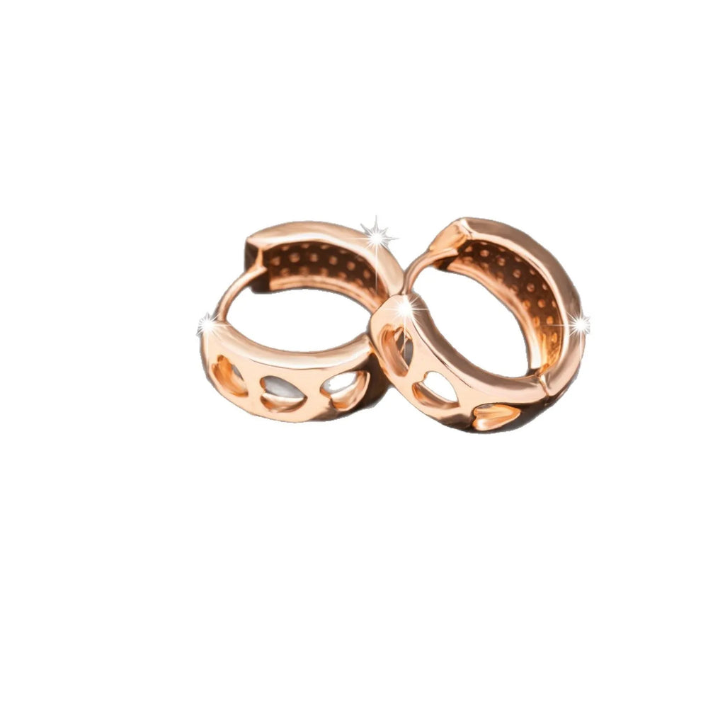 Rose gold hollowed-out heart earrings with circular 2.5cm diameter on white background