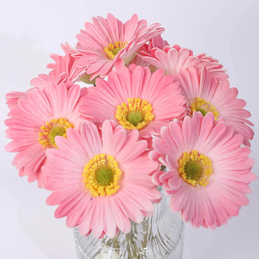 Silk flower artificial bouquet in a white pu pot with multi-coloured floral options