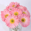 Silk flower artificial bouquet in a white pu pot with multi-coloured floral options