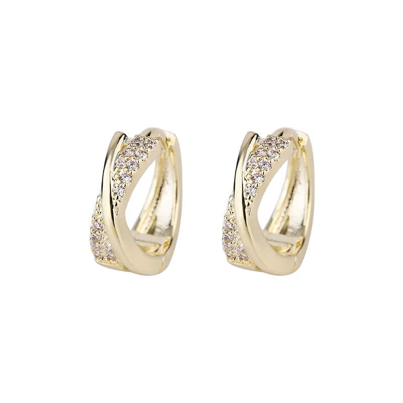 Geometric stud earrings with 14K yellow gold plating and zircon accents on copper base