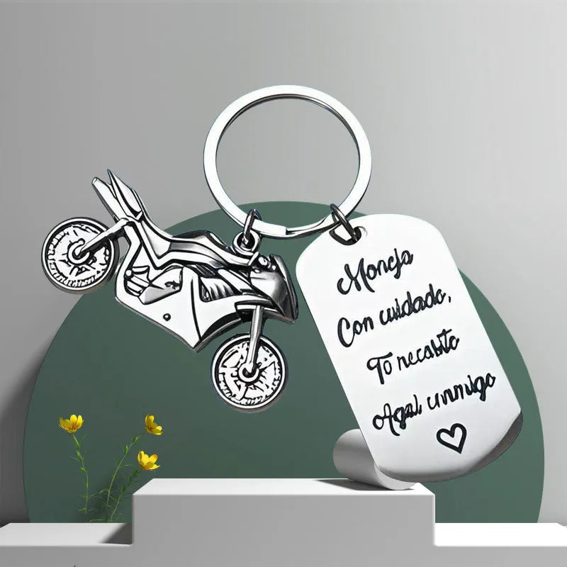 Stainless steel key ring with motorcycle design and flannel storage bag for key organisation