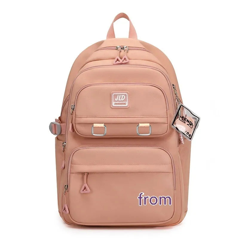 Girls' large capacity nylon school backpack with physiological curve backplane in purple colour