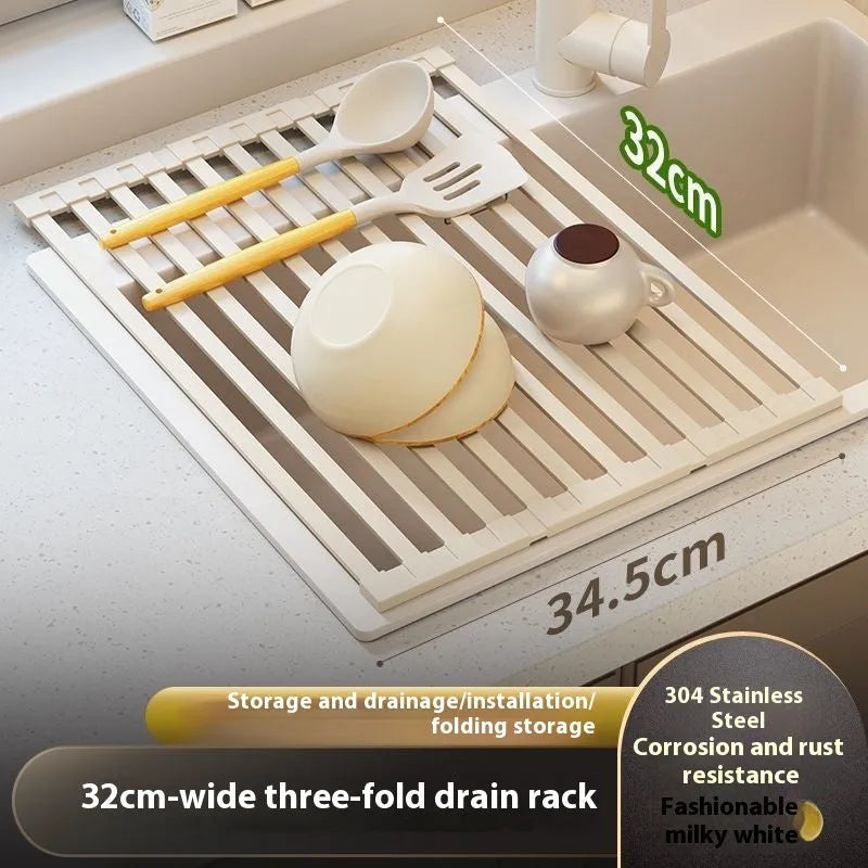 Milky white foldable stainless steel kitchen draining rack with tri-fold design on a sink