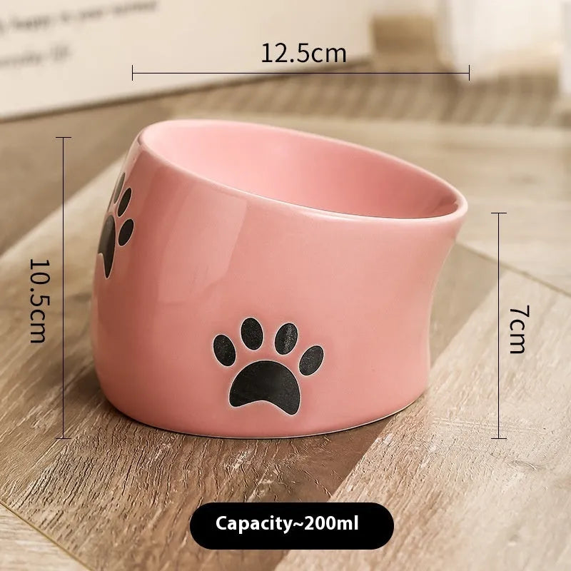 Ceramic cat bowl with high foot design and cat's paw pattern in choice of colours