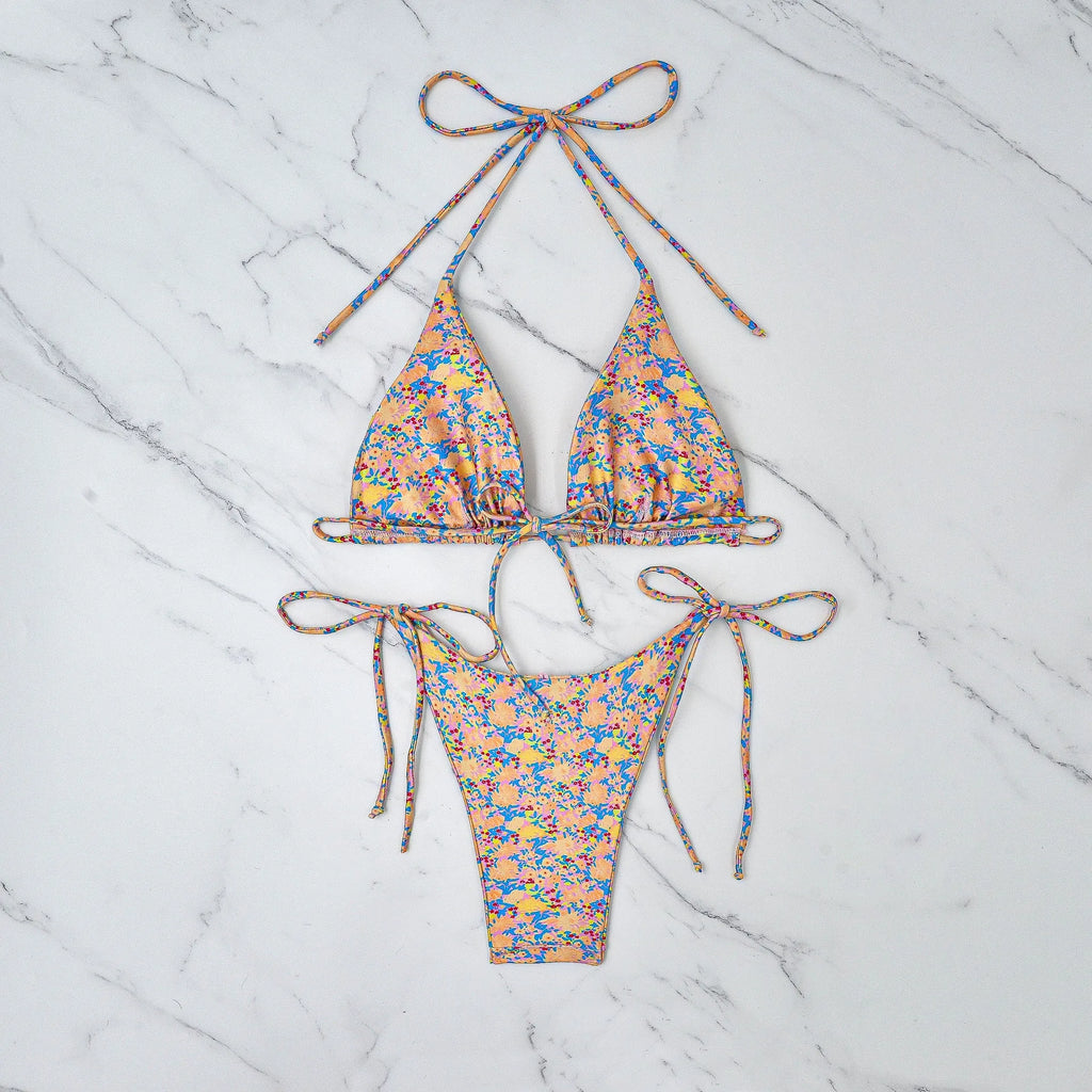 A picture colour lace-up bikini swimsuit with a backless, European and American split design.