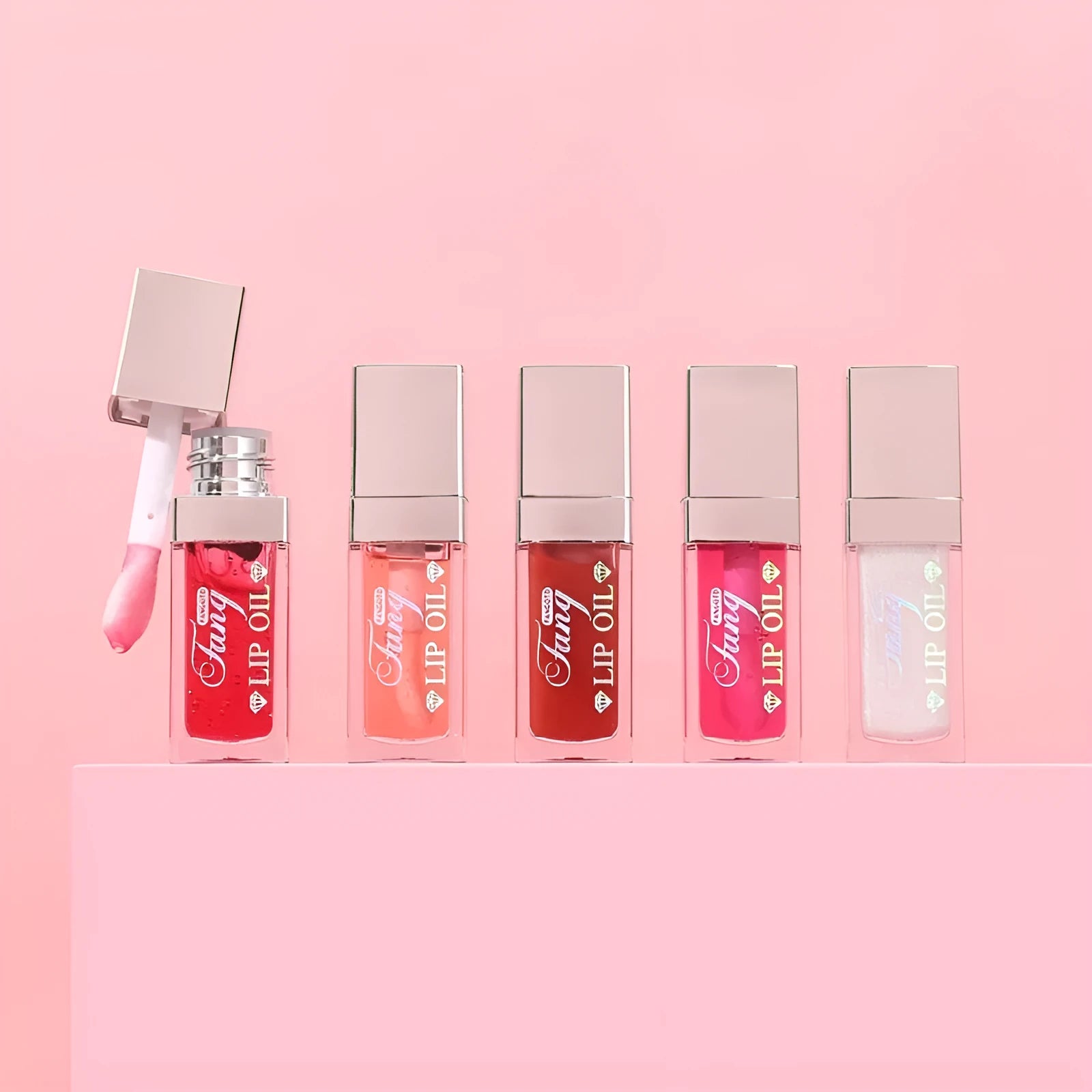 Bright hydrating mint lip gloss in five colour shades with lip essence oil