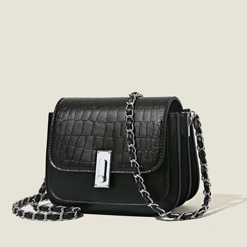 Women's black chain shoulder bag with cross-body strap and internal phone pocket, horizontal square shape
