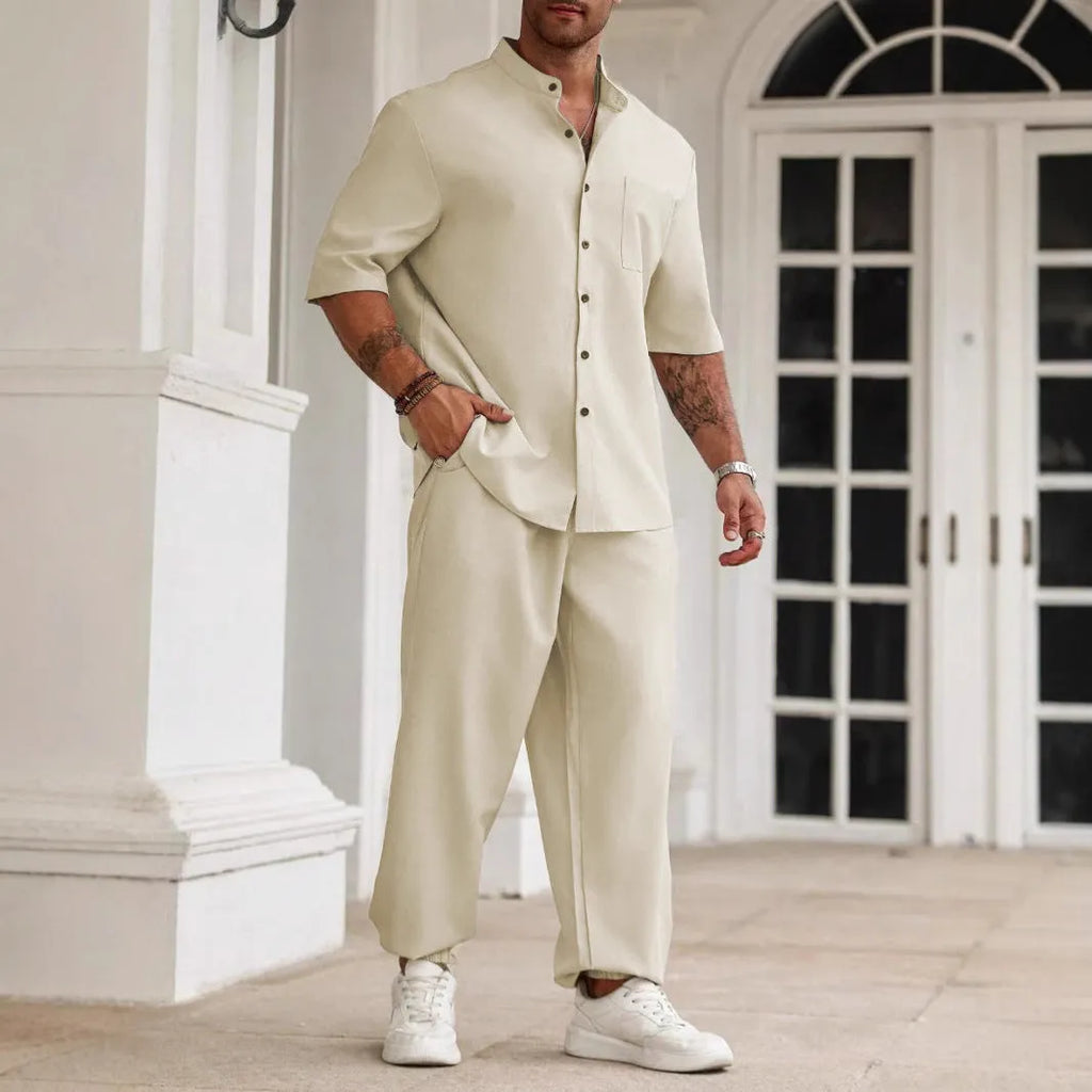 Men's apricot coloured cotton linen casual short-sleeved shirt and matching trousers laid flat.