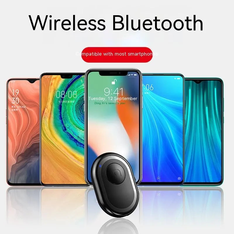 Bluetooth remote control for smartphones with self-timer, showing black, pink and purple colour options