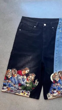 Blue men's cotton shorts with a Jesus design on the back pocket, showing tapered leg.