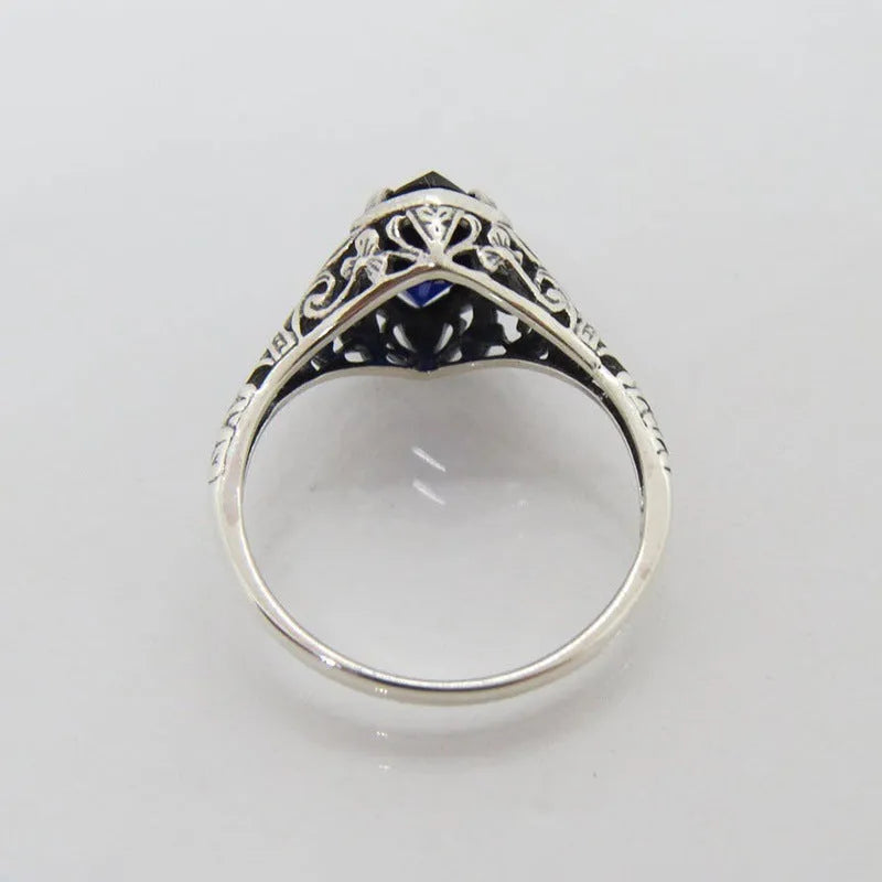 Women's silver geometric hollow ring with zircon stones on alloy base