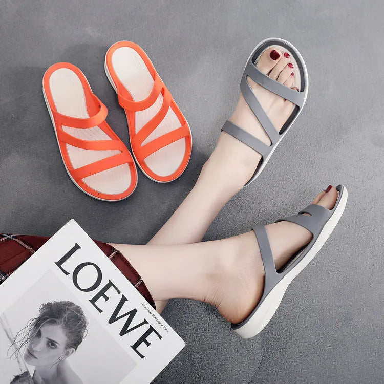 Women's solid colour casual sandals with a breathable PP upper, shown in red.