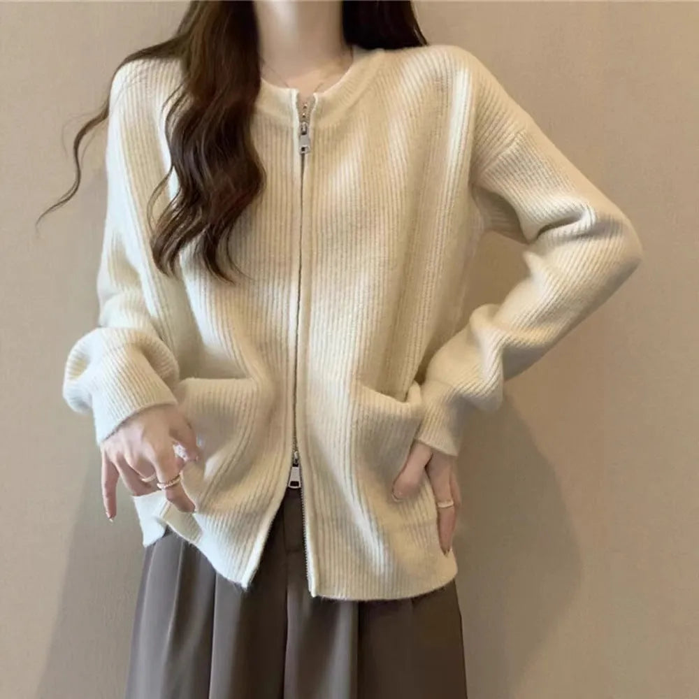Beige viscose sweater coat cardigan with long sleeves showing soft texture and cardigan style