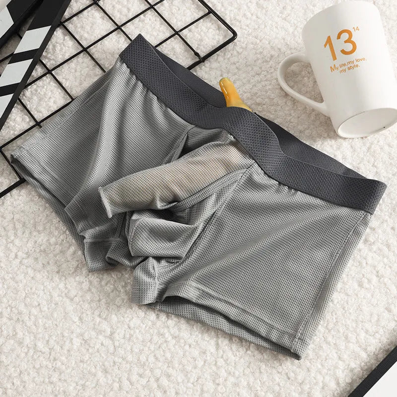 Men's ice silk boxer underwear in breathable mesh fabric showing low waist design