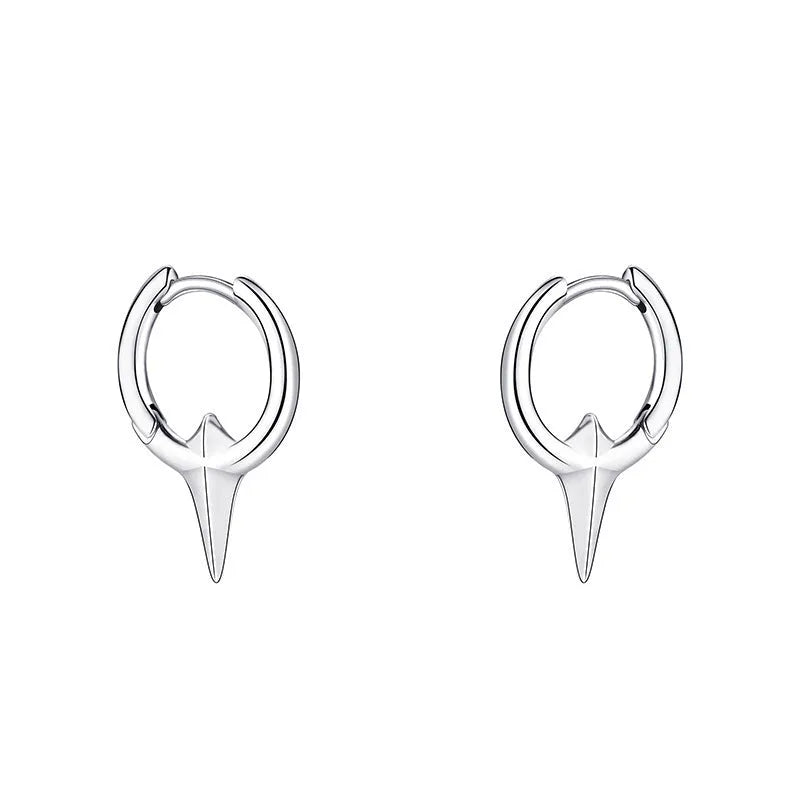 Geometric star ear clips with white gold electroplating on copper, showing secure clip mechanism and detailed star shape