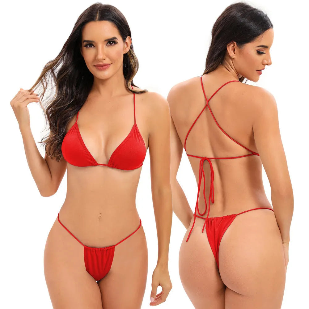 Women's candy coloured cross strap swimsuit with multiple straps and briefs style