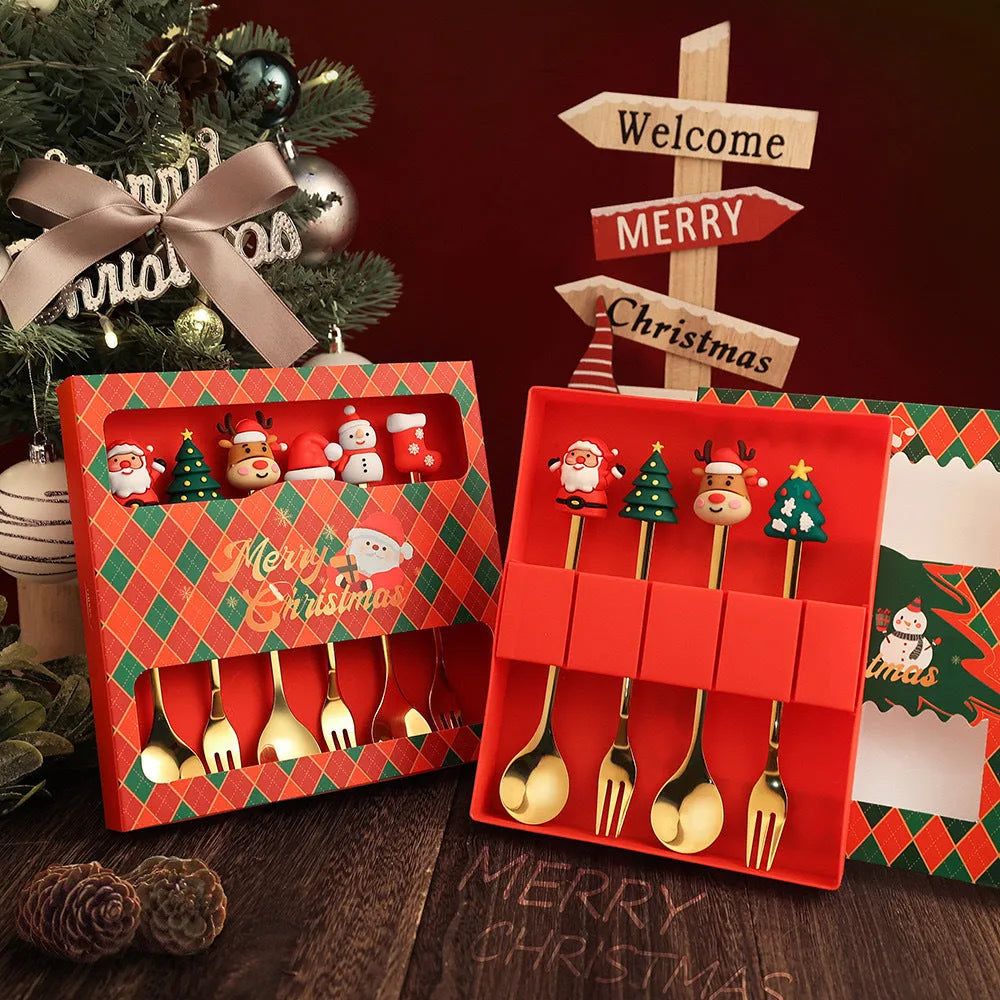 Red-handled Christmas spoon and fork set with tree, snowman, Santa, reindeer and stocking designs
