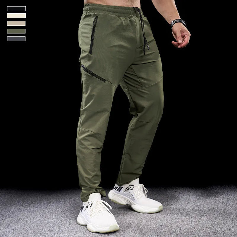 Men's waterproof quick-dry nylon workout trousers in multiple colours for sports and fitness activities
