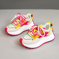 Women's green and red dad shoes with raised rubber sole, synthetic leather upper, round toe and front lace-up