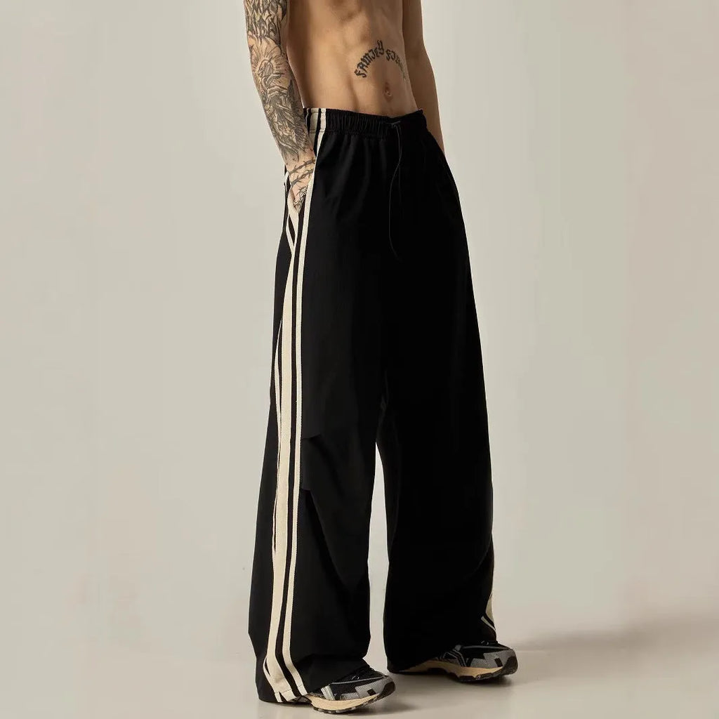 Men's black wide leg climbing pants with high-waist straight-leg design for leisure wear