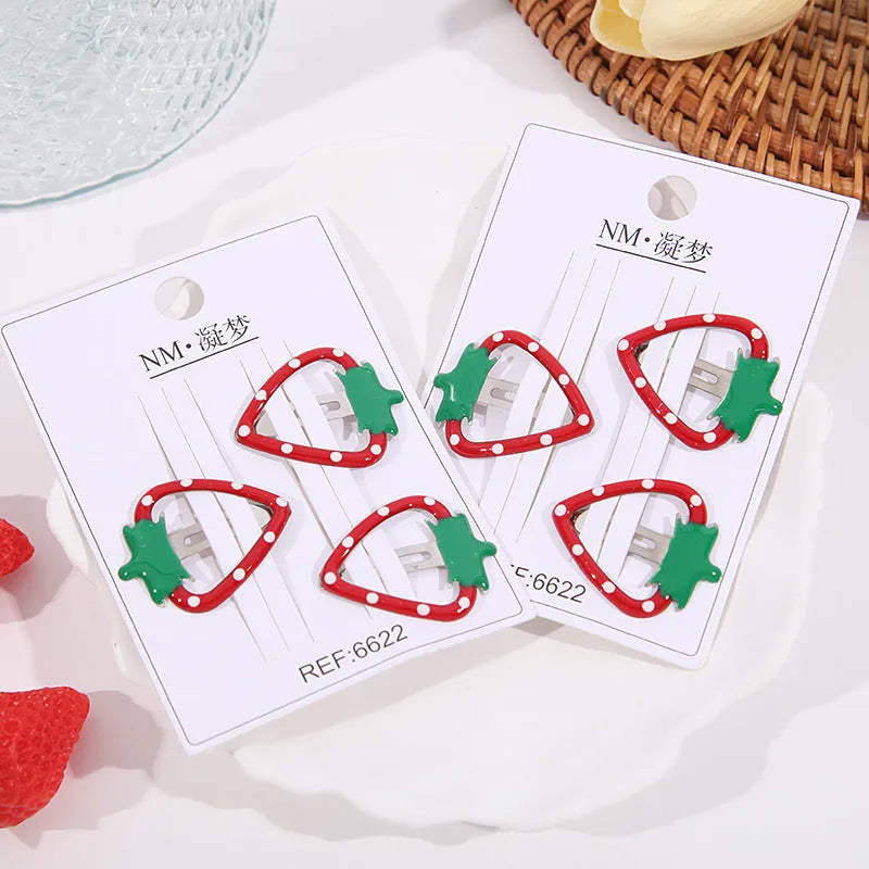 Children's cartoon fruit hair clips in cherry, apple and strawberry designs, plastic barrettes set