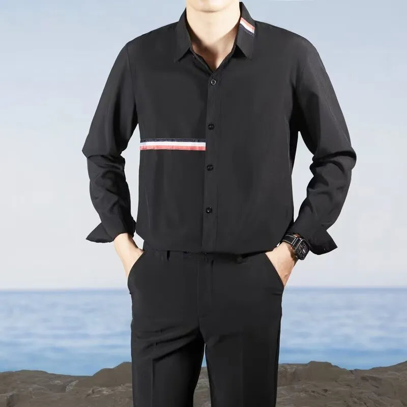 Man's loose-fit Hong Kong style cardigan shirt in a cotton blend fabric, shown in light blue.