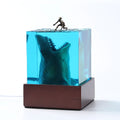Ocean Shark Surfer resin night light ornament with integrated LED holder in 5cm or 8cm size, showing handcrafted shark surfing scene