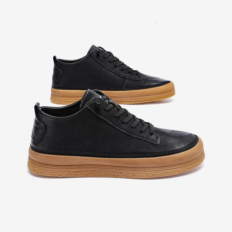 Men's black casual leather shoes with round toe, flat heel, and lanyard closure on neutral background
