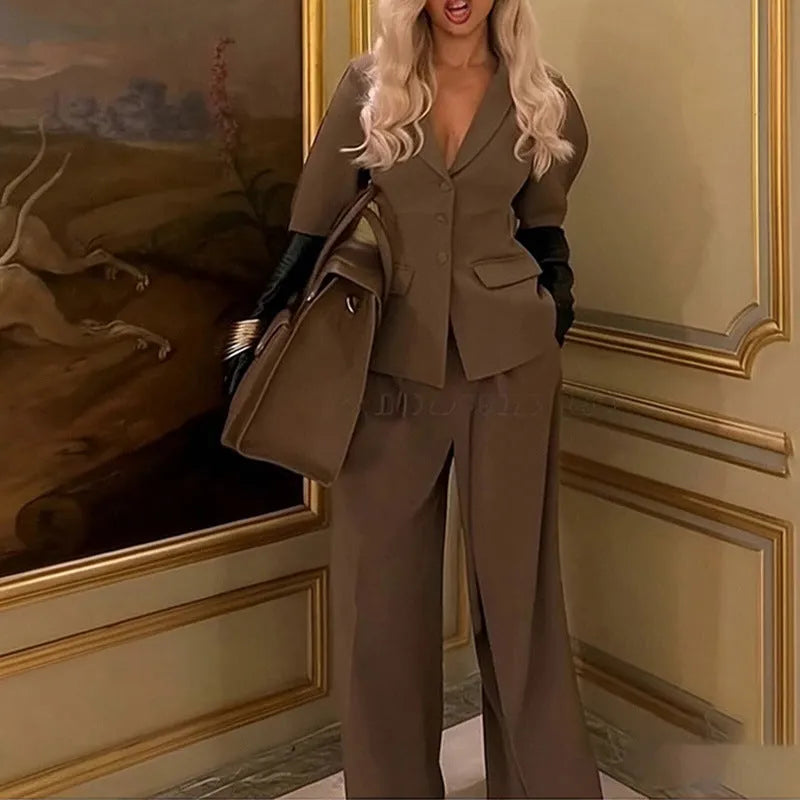 Brown polyester slim fit waist suit with trousers, showing long sleeves and tailored silhouette