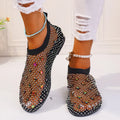 Women's mesh flat sandals with colourful rhinestone design on round toe, showing rubber sole and breathable upper