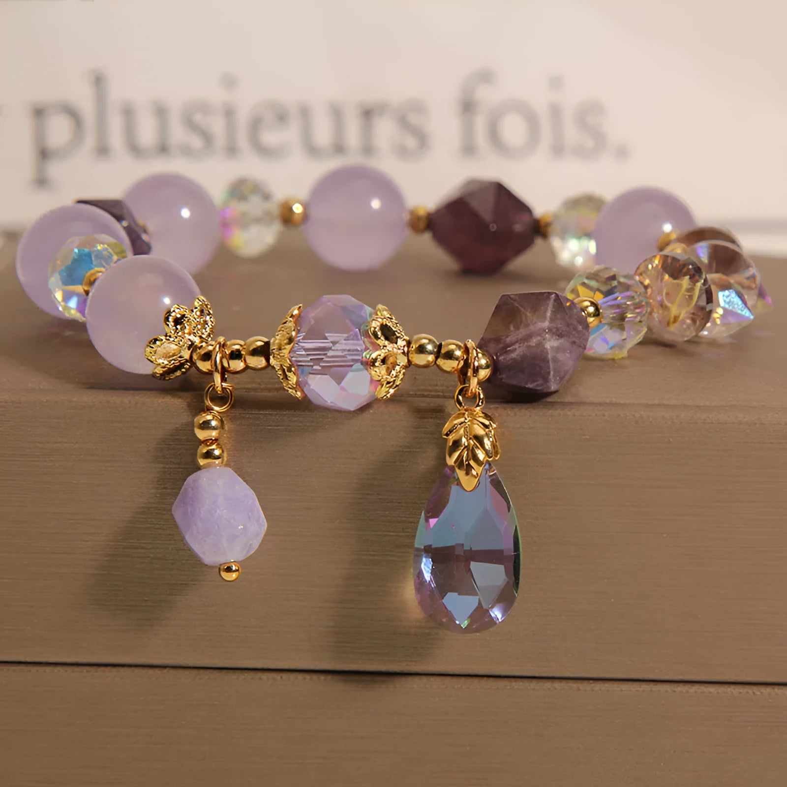 Lavender purple crystal water drop bracelet for children in a retro design.