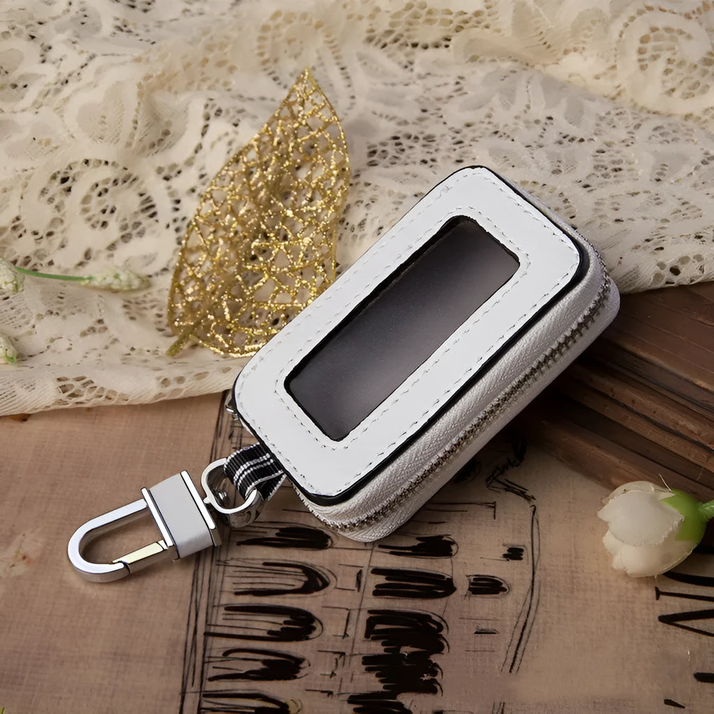 White genuine leather car key case with square vertical design and plain weave texture