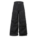 Black pleated multi-pocket workwear jeans with a mid waist and zip fly.