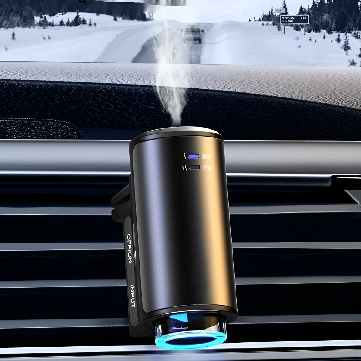 Obsidian black car vent clip aroma diffuser with essential oil bottle on a car air vent.