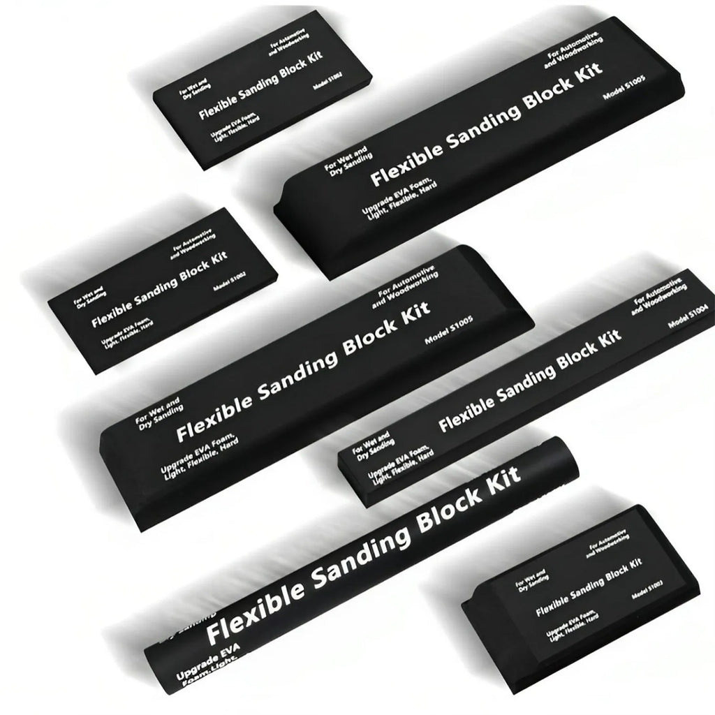 Seven black EVA frosted blocks with metal construction arranged on a work surface