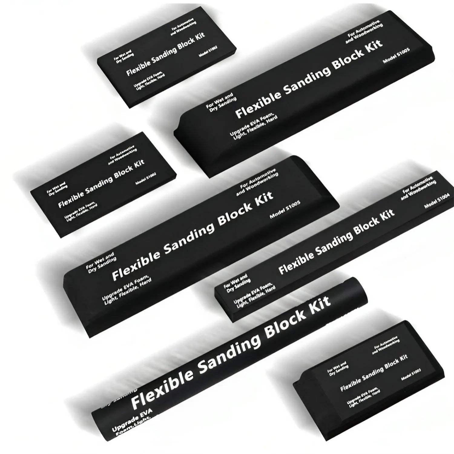 Seven black EVA frosted blocks with metal construction arranged on a work surface