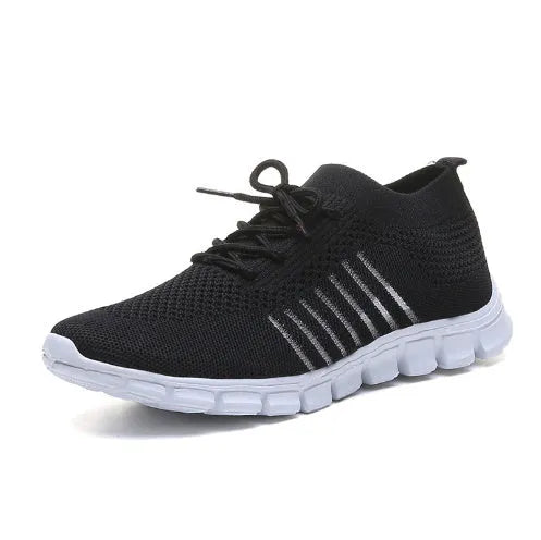 Women's breathable platform sneakers in multiple colours on a white background, showing lace-up front and flat rubber sole.