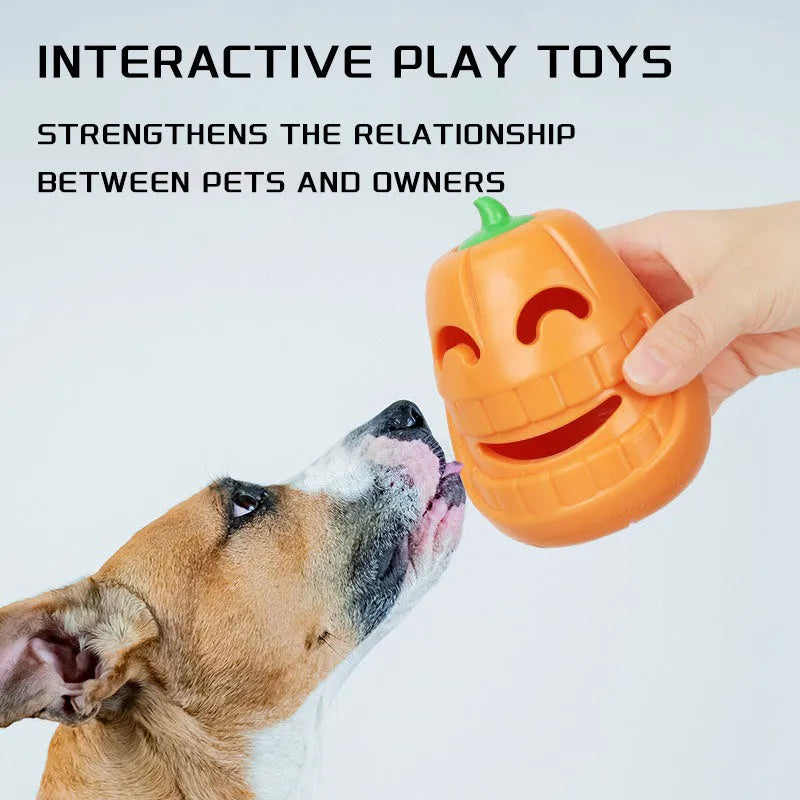 Orange Halloween pumpkin shaped dog chew toy with treat dispensing funnel opening