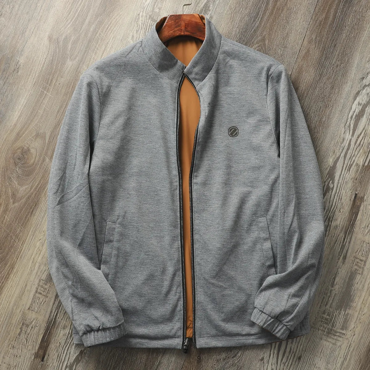 Men's Army Green stand collar casual jacket on a hanger, showing button front and regular sleeve cut.