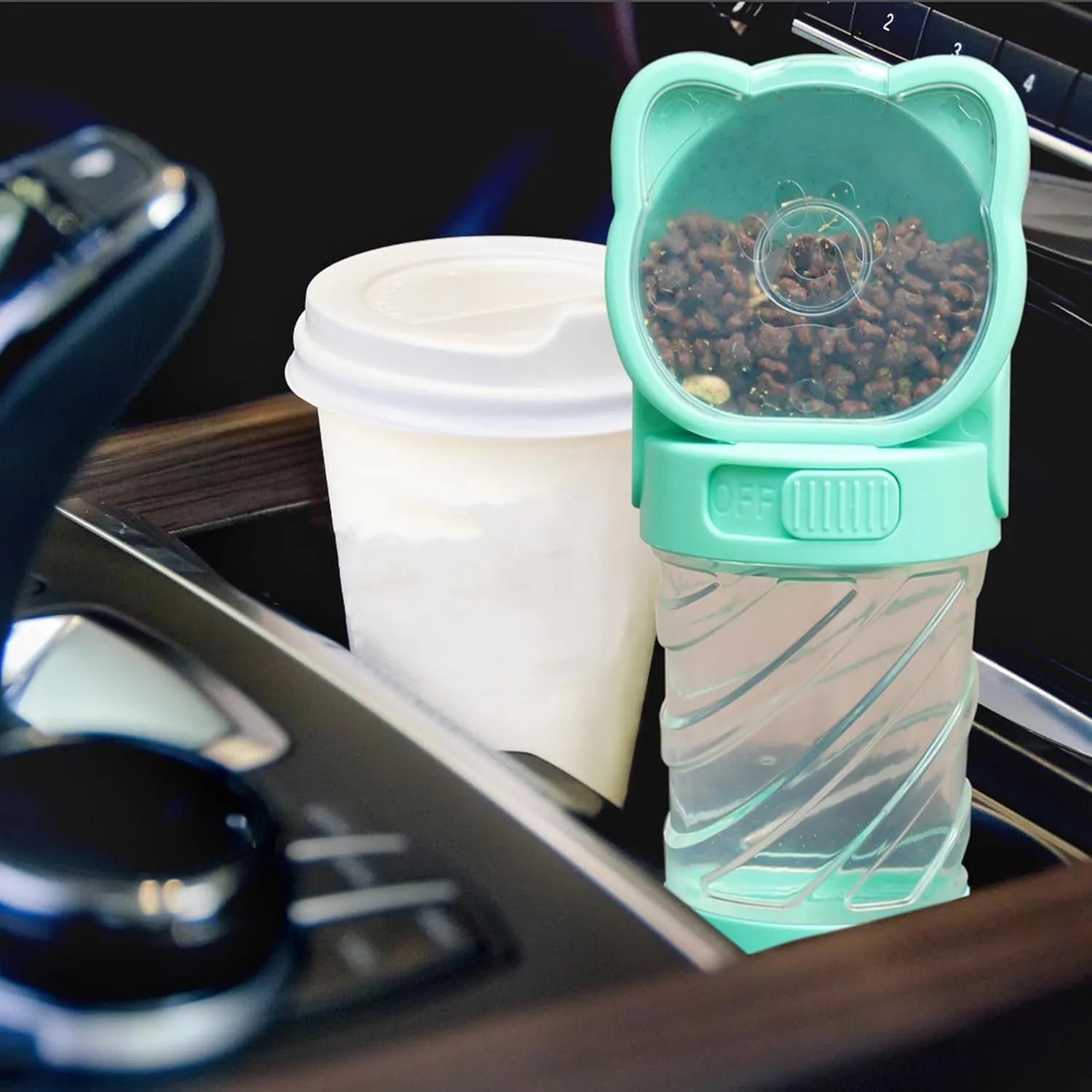 Green 3-in-1 portable pet water bottle showing water dispenser, food container, and waste bag compartment