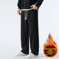 Men's double-sided polar fleece-lined winter trousers with drawstring waist in apricot, black, or dark grey