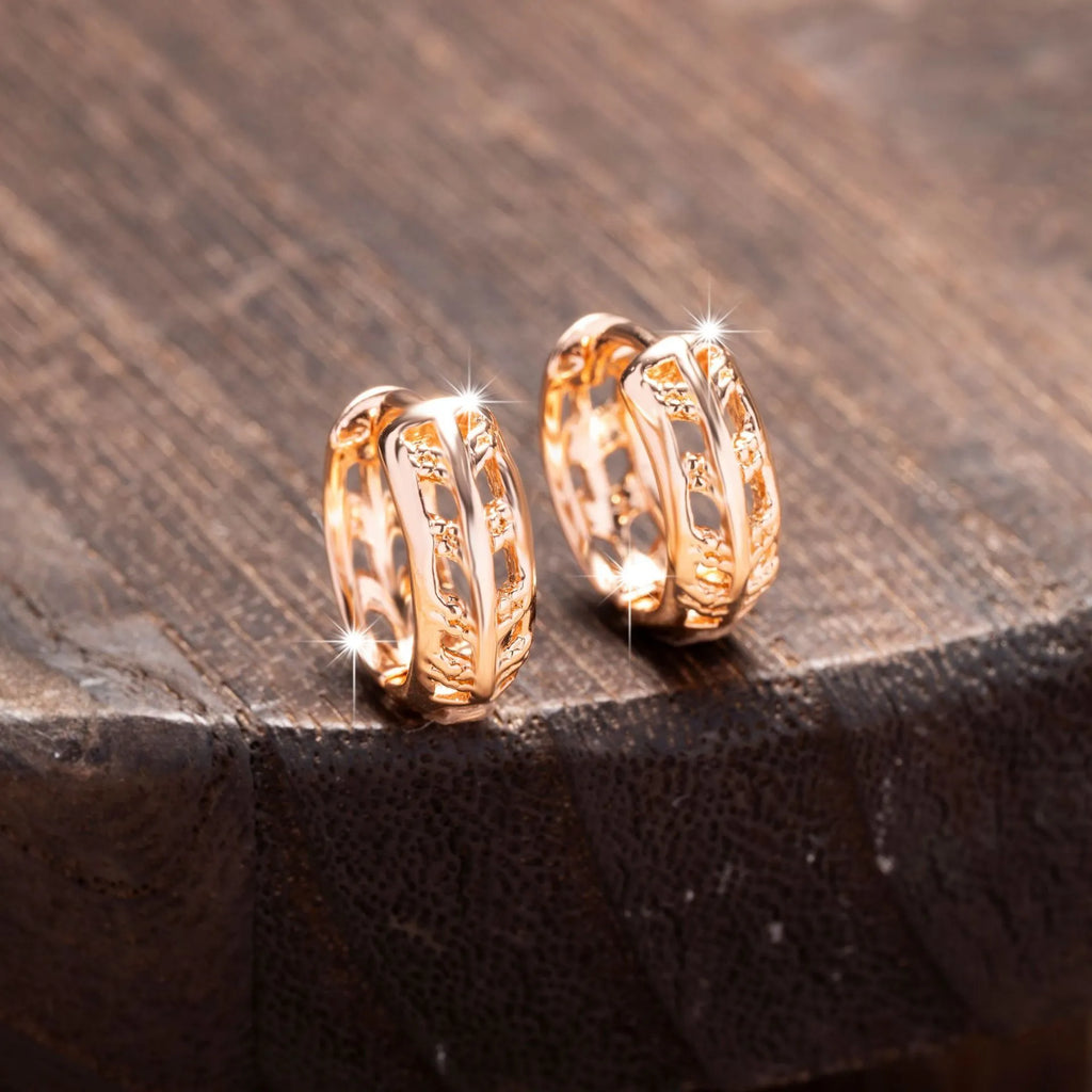 Rose gold leaf-shaped hollowed-out earrings with heart detail, copper construction, 3cm drop length